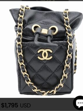 CHANEL Black Quilted Mini Drawstring Bucket Bag with Chain Strap